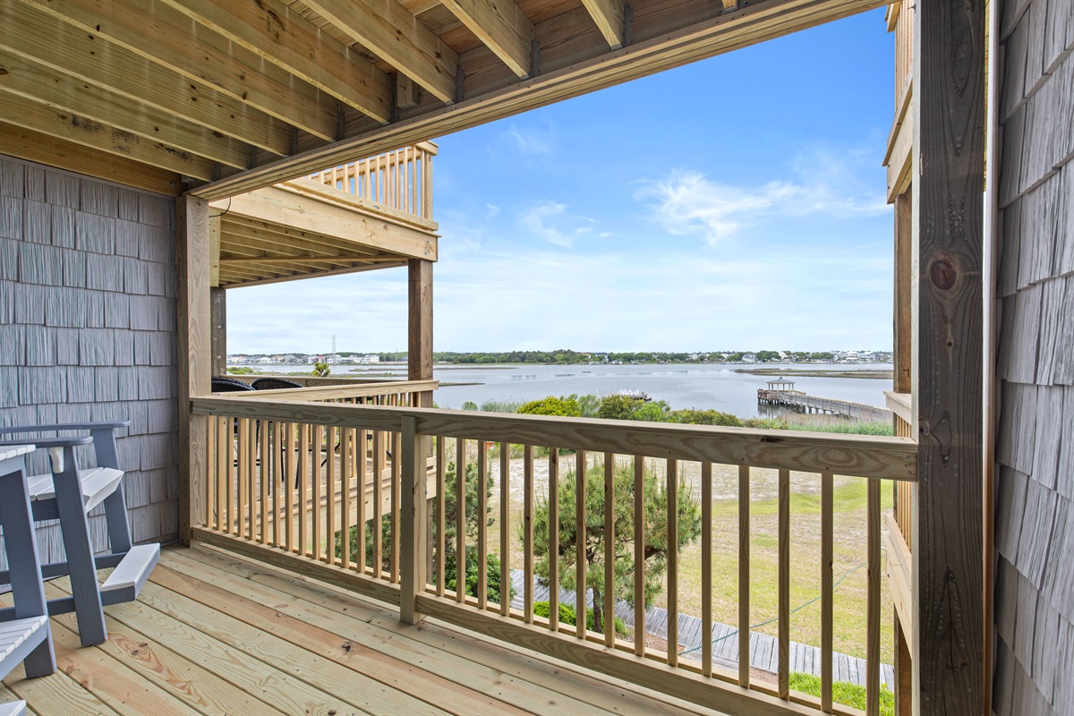 Relax on the deck and take in peaceful coastal scenery