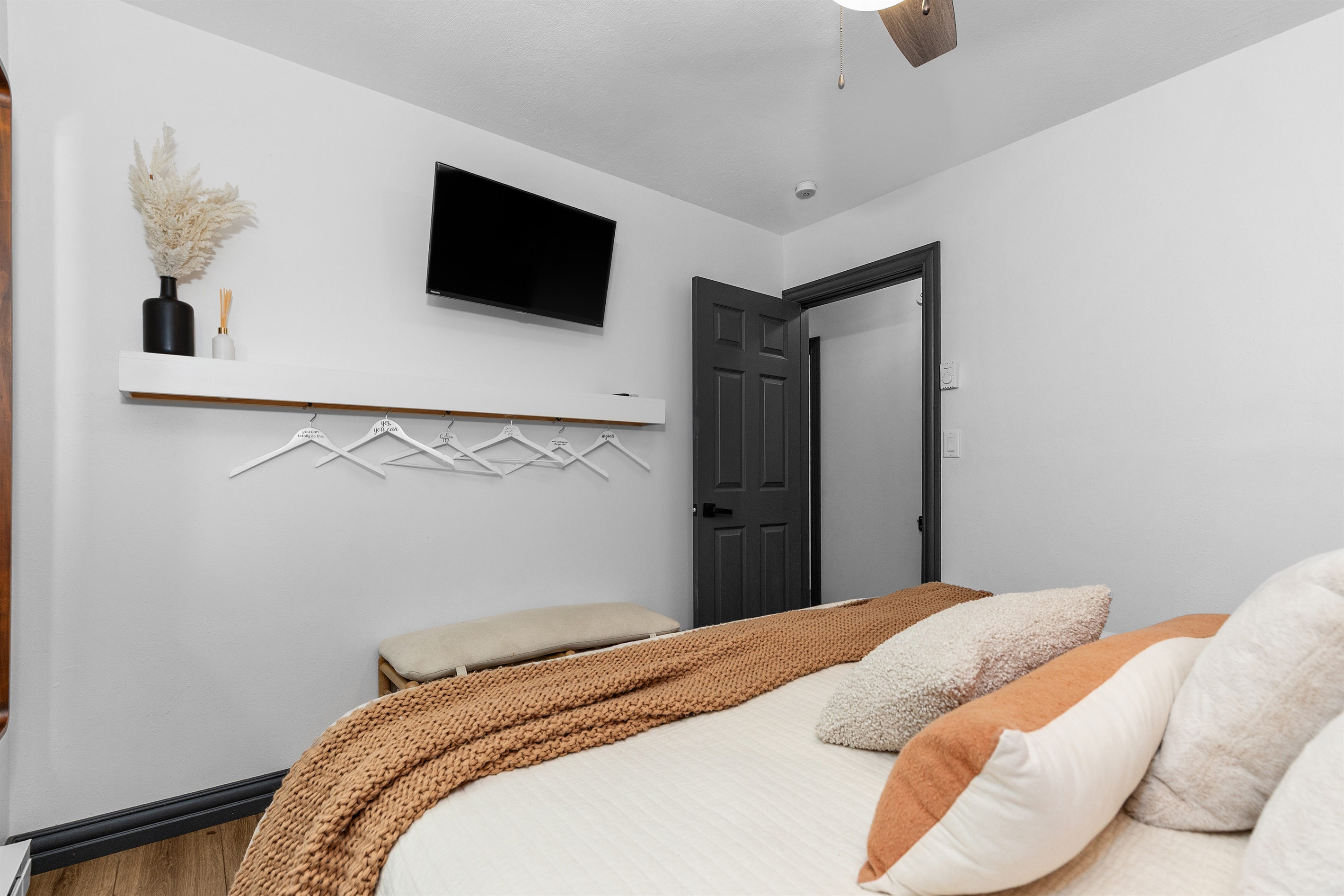 A cloud-like king bed awaits, complete with plenty of pillows for the perfect night's rest.