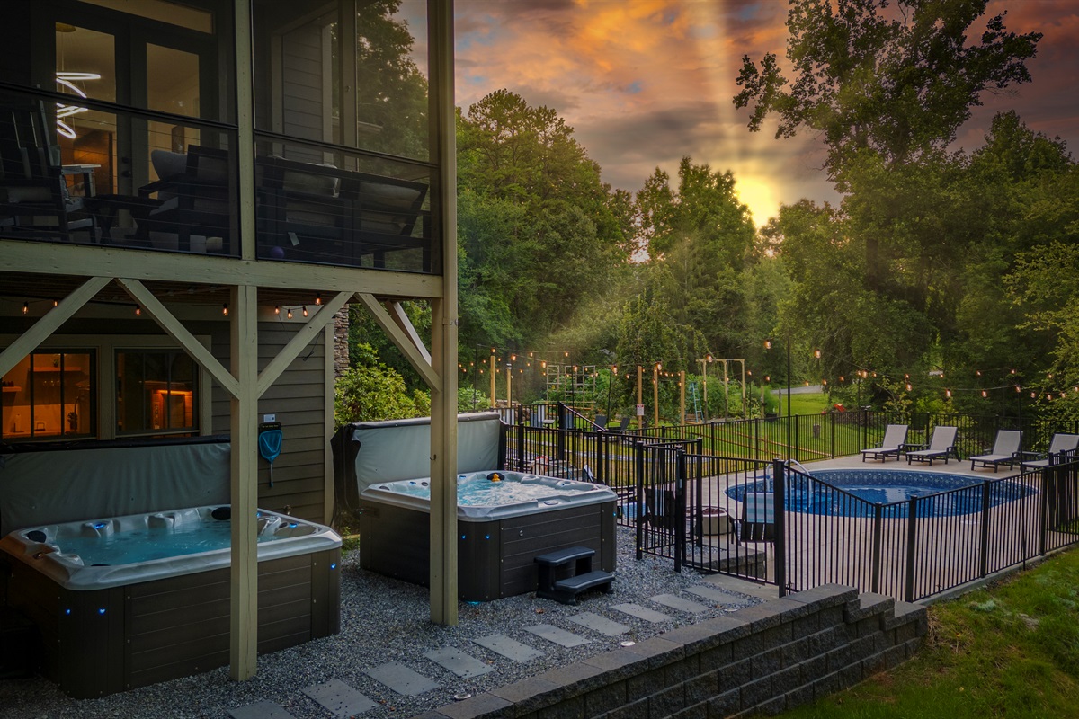 Your group will enjoy fun nights soaking in two private hot tubs overlooking the forest with seasonal mountain views. 