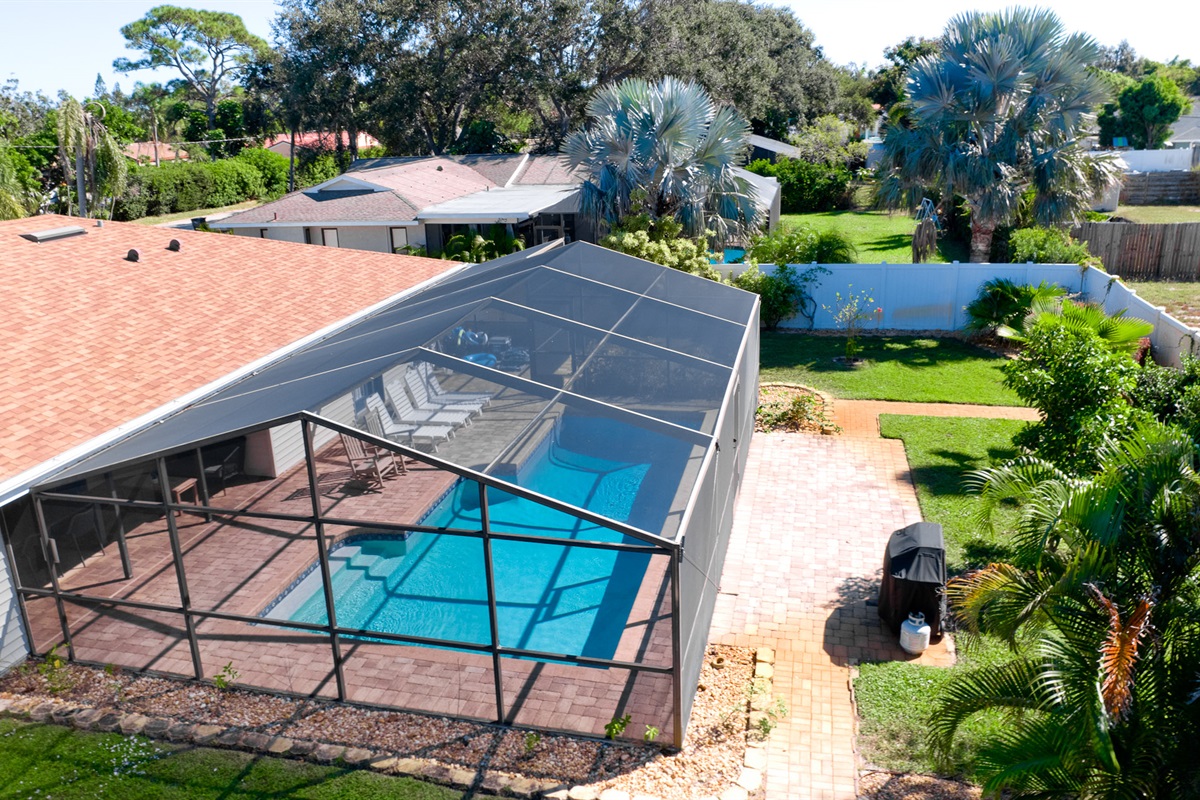 Your sun-drenched getaway with a sparkling caged pool