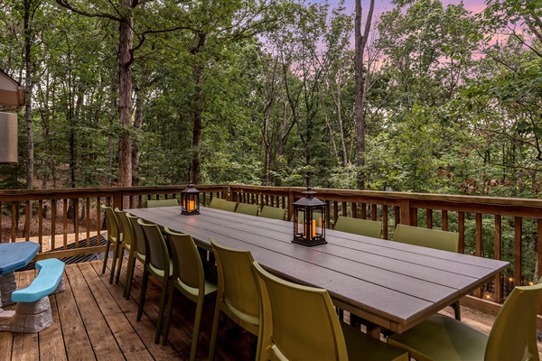 Outdoor dining for the whole crew — lantern-lit dinners in the trees