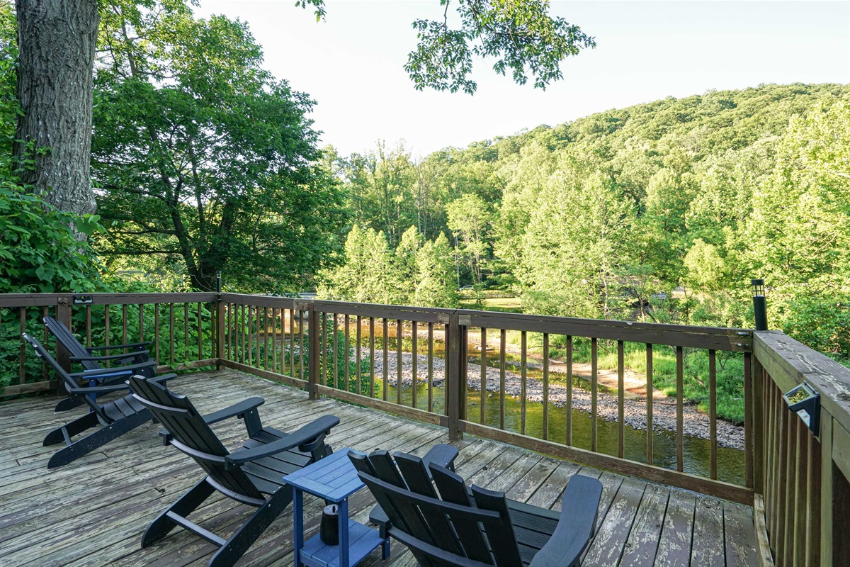 enjoy our deck right across the road overlooking the river!