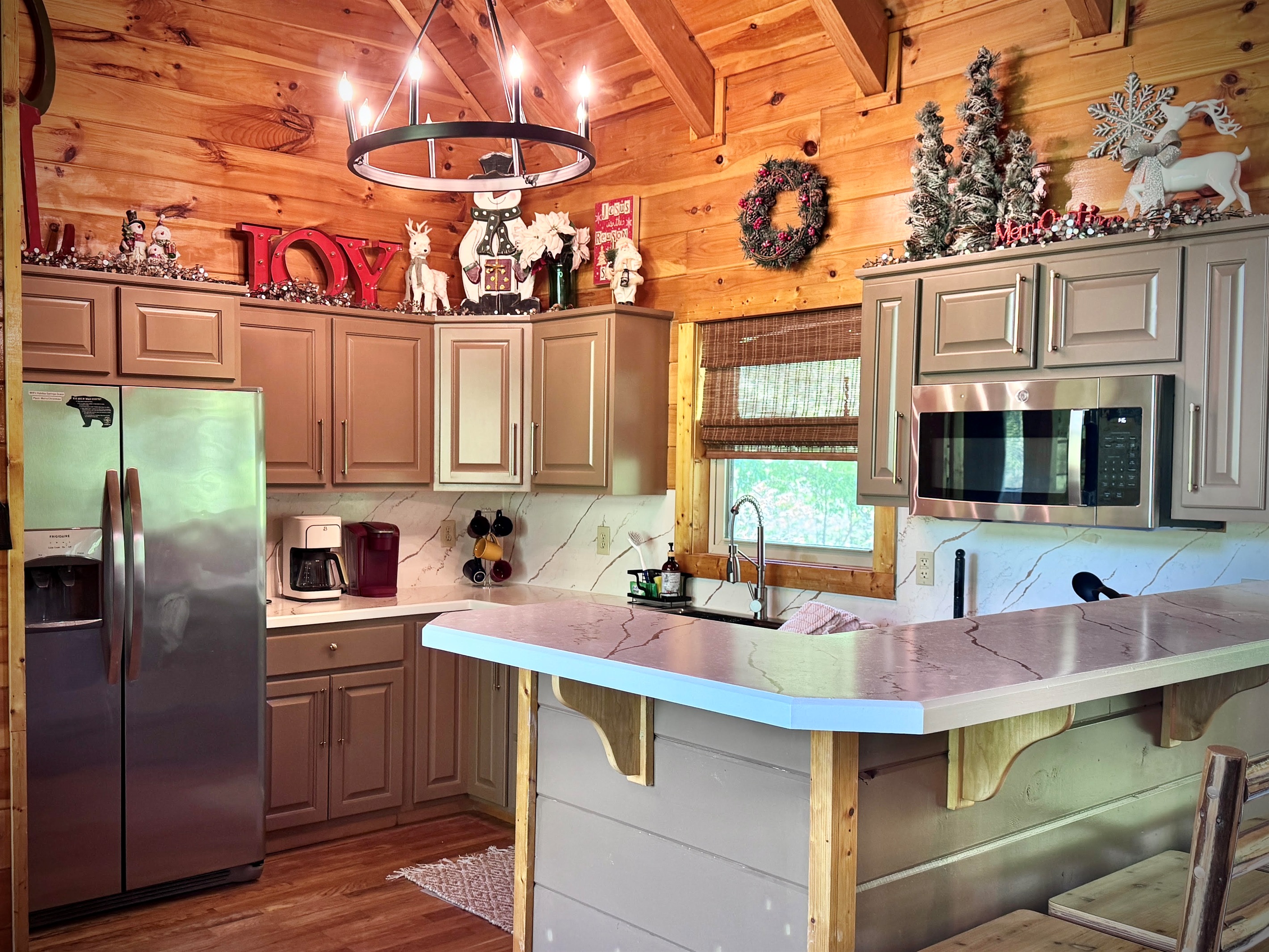 Kitchen - freshly updated!  Beautiful new cabinet color, new counters, new lighting, new dishwasher and new blinds!