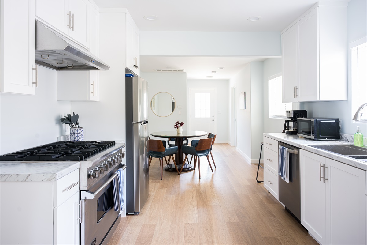 Huge gas range, oven and plenty of counterspace for meal prep. 