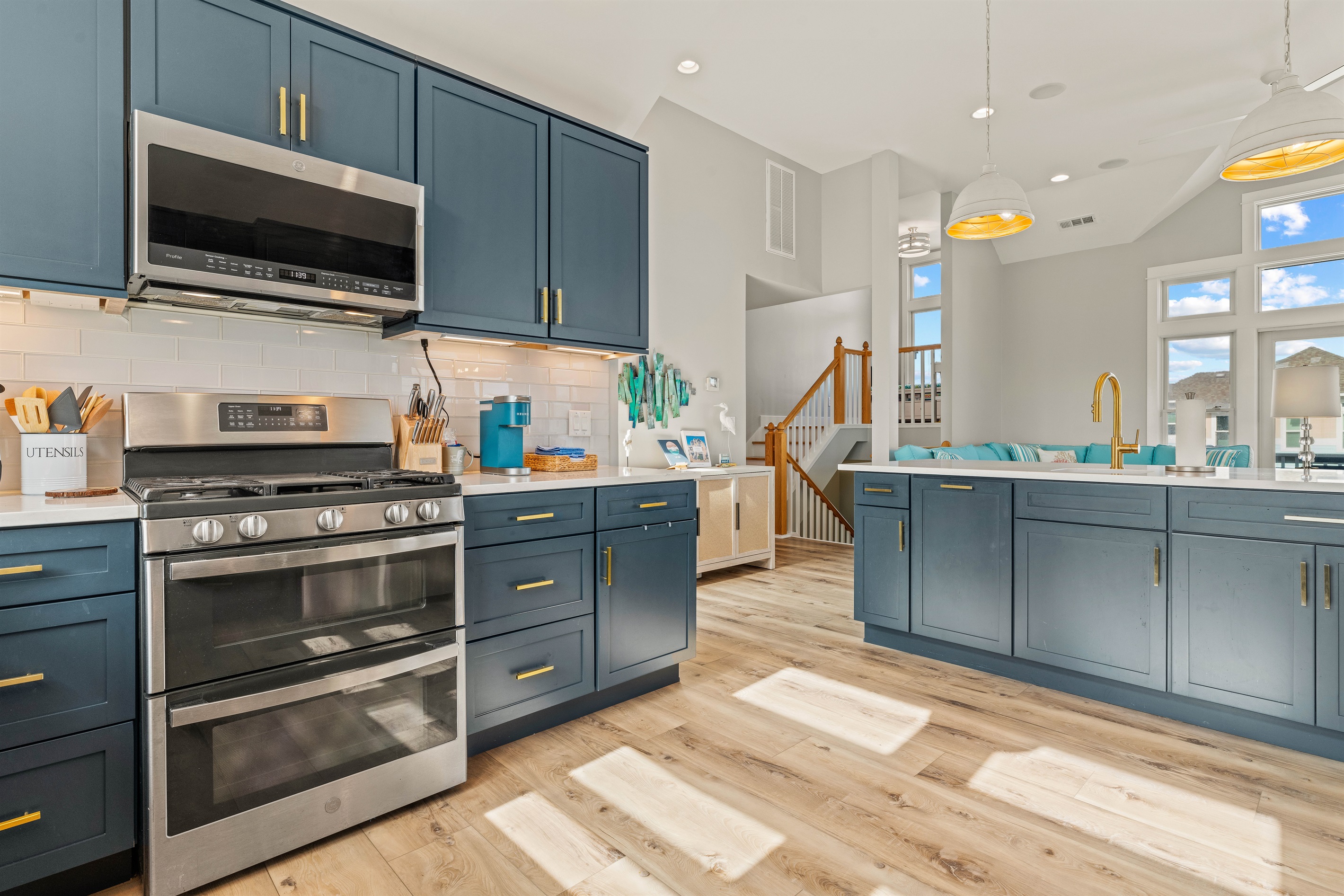 Gas stove with double oven and two (2) microwaves