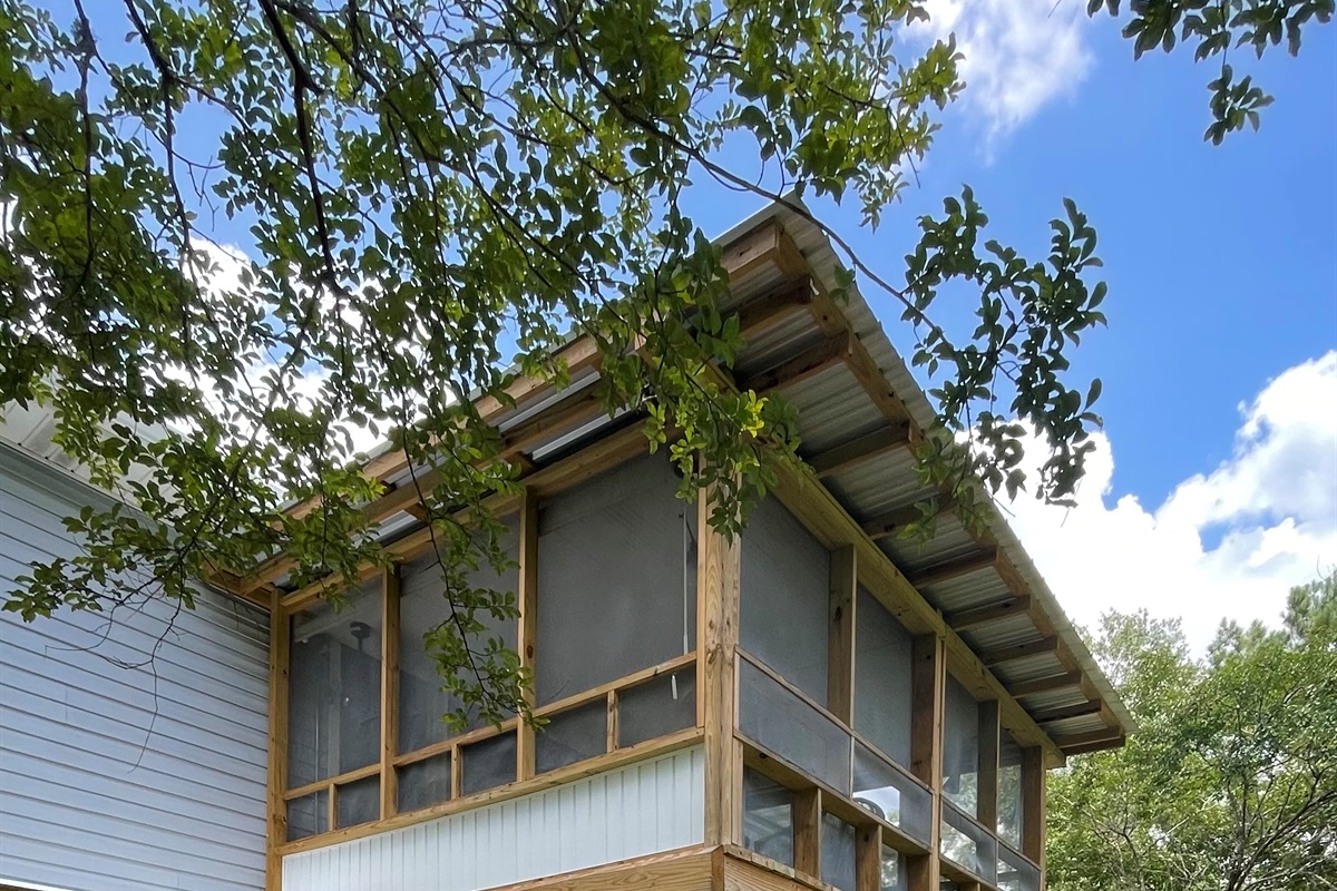 Open the door from downstairs and enjoy the gravel patio with seating