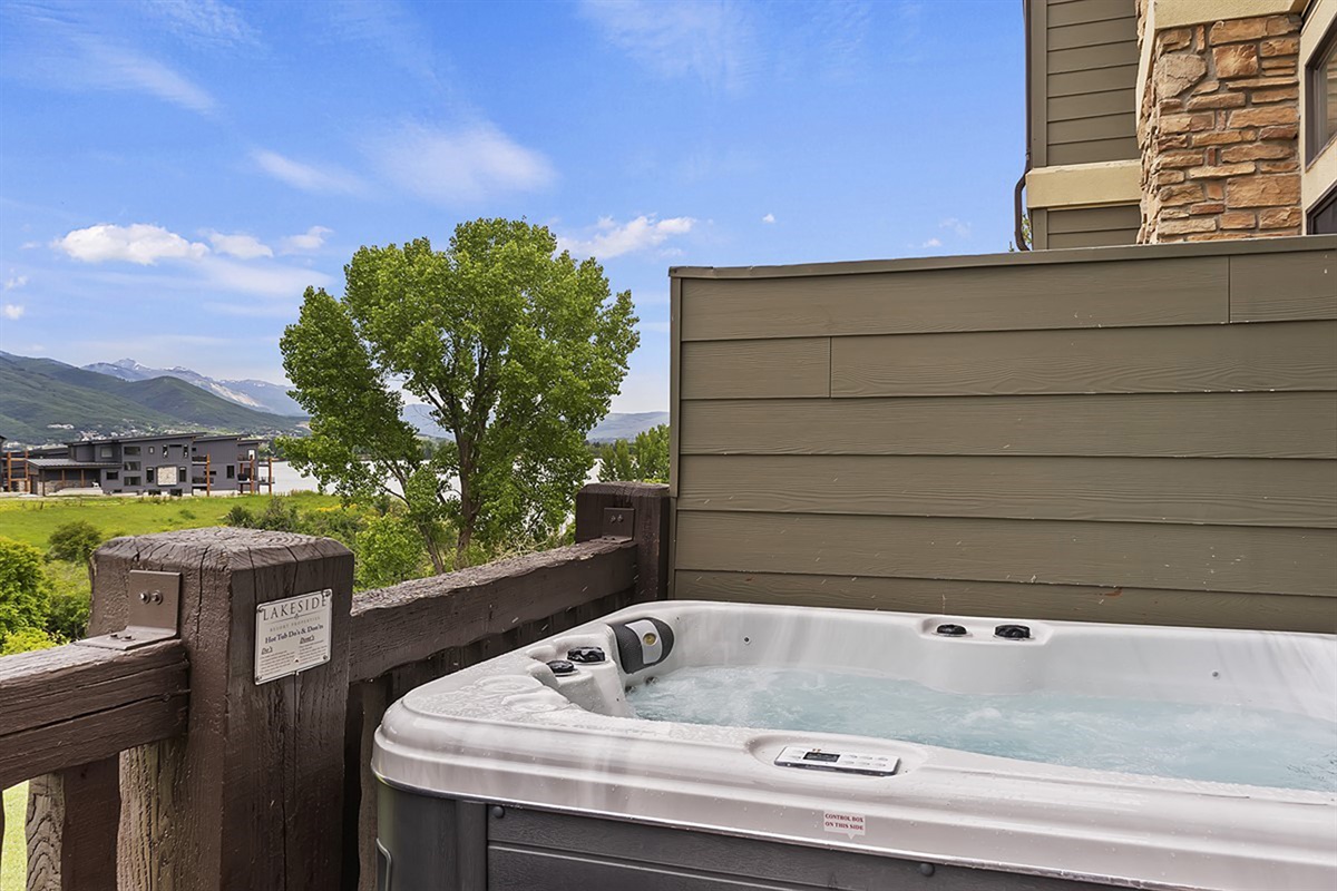 Soak in the private Hot tub and enjoy the mountain air.