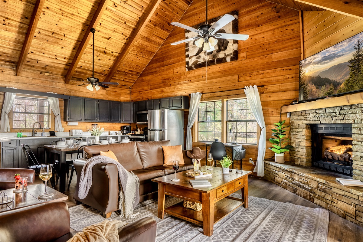 A cozy and luxury cabin in Sevierville. Having an interior kitchen, living room, and a warm fireplace. Outstanding for family vacation cabins in Sevierville. 