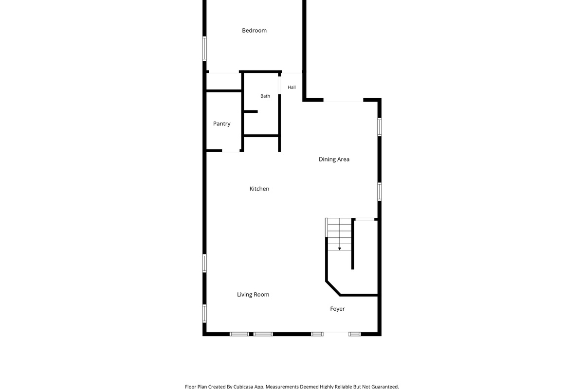 See how it all connects: kitchen, dining and living flowing together, plus a main floor bedroom and bath. Nearly a thousand square feet downstairs, designed to keep everyone in easy reach of each other and the food.