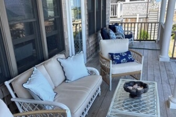 Relax on the porch with sweeping ocean views—your serene coastal escape.