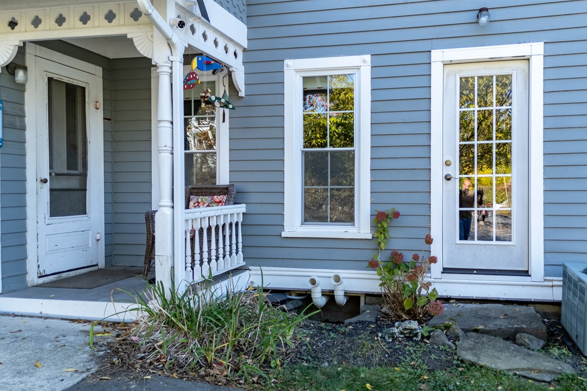 Inviting entryway with charming details and easy access to the outdoor patio for sunny mornings