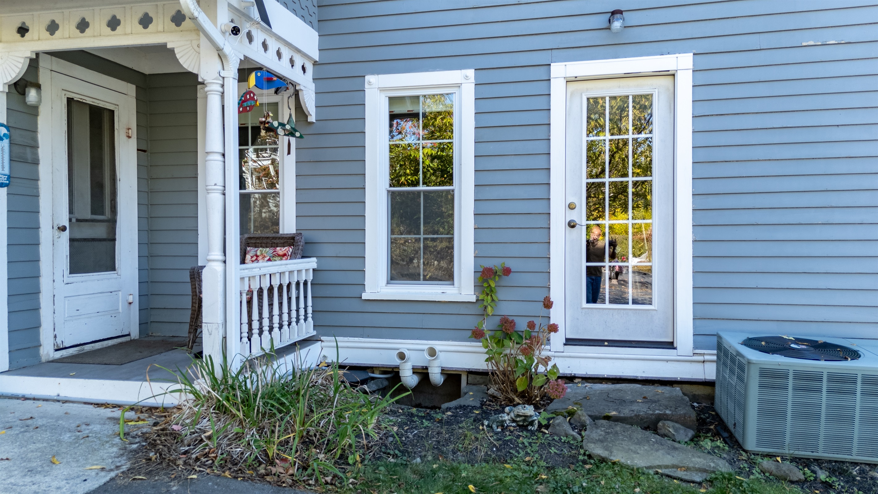 Inviting entryway with charming details and easy access to the outdoor patio for sunny mornings