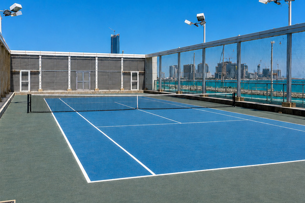 Rooftop tennis court free for guests