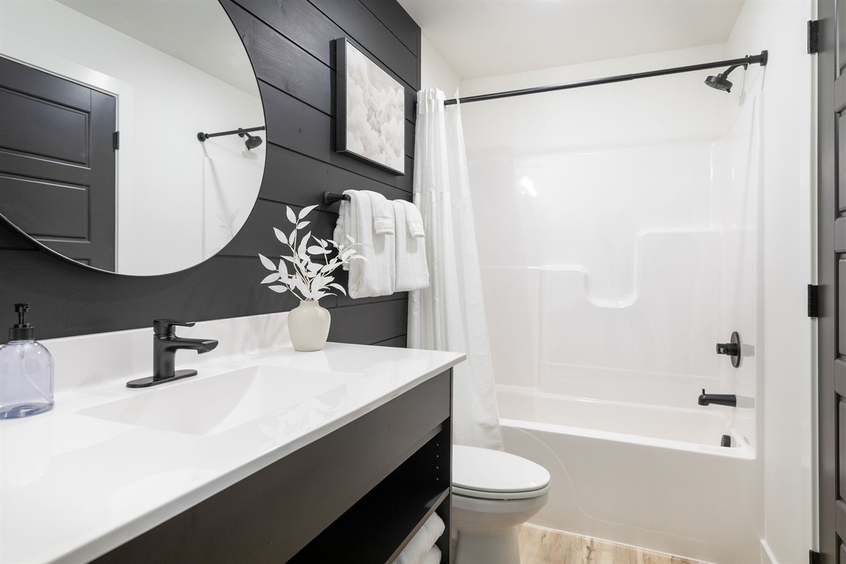 Main level King #3 attached bath. Also accessible from hallway