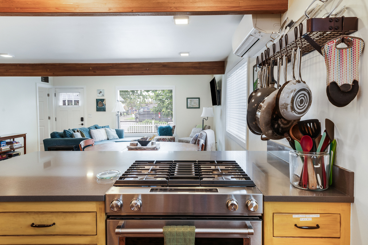 Stand at the stove and look out the picture window at the park.