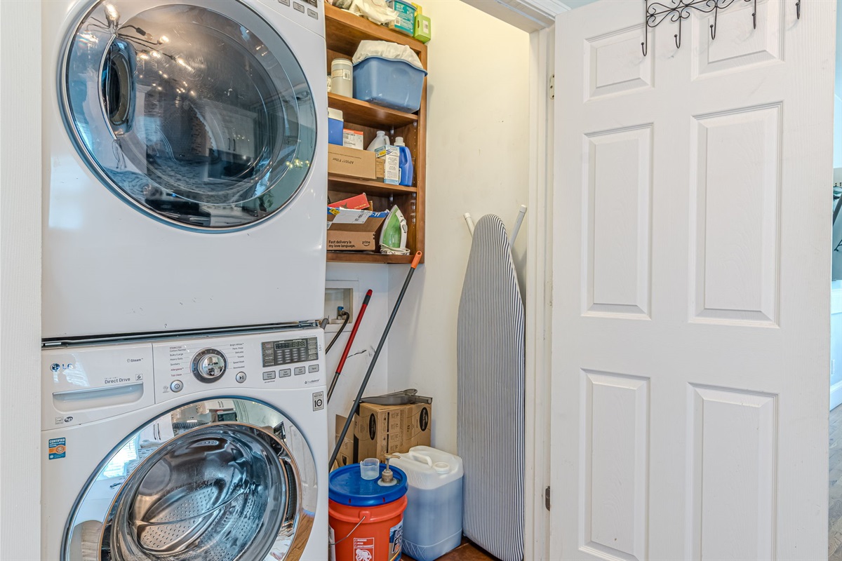 Full-size washer and dryer with complimentary laundry soap for 2 loads—plus an ironing board for your convenience.s