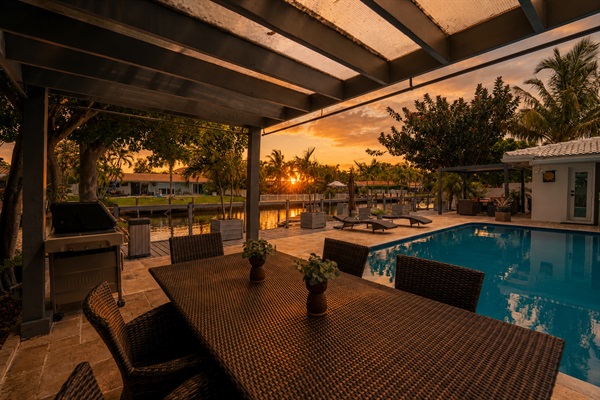Waterfront outdoor oasis with lounge seating