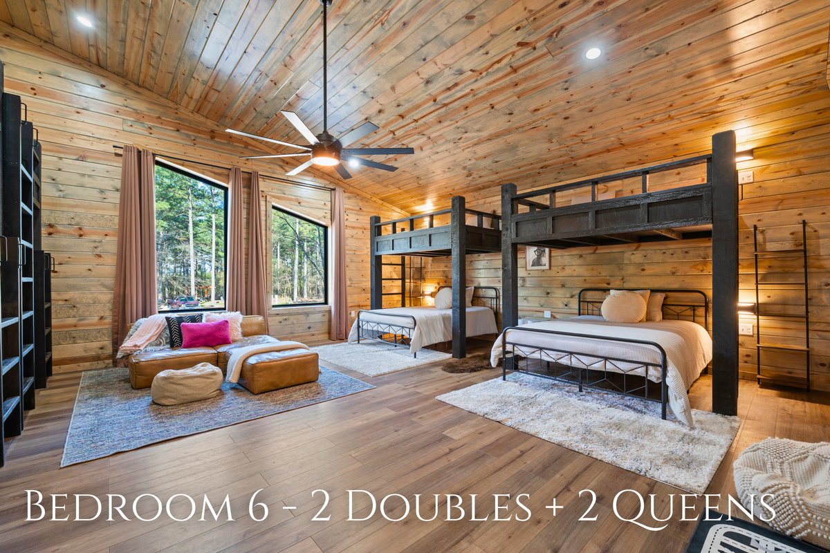Designed with larger groups in mind, this spacious bunk room offers a mix of queen and double beds while still leaving plenty of room to spread out.
