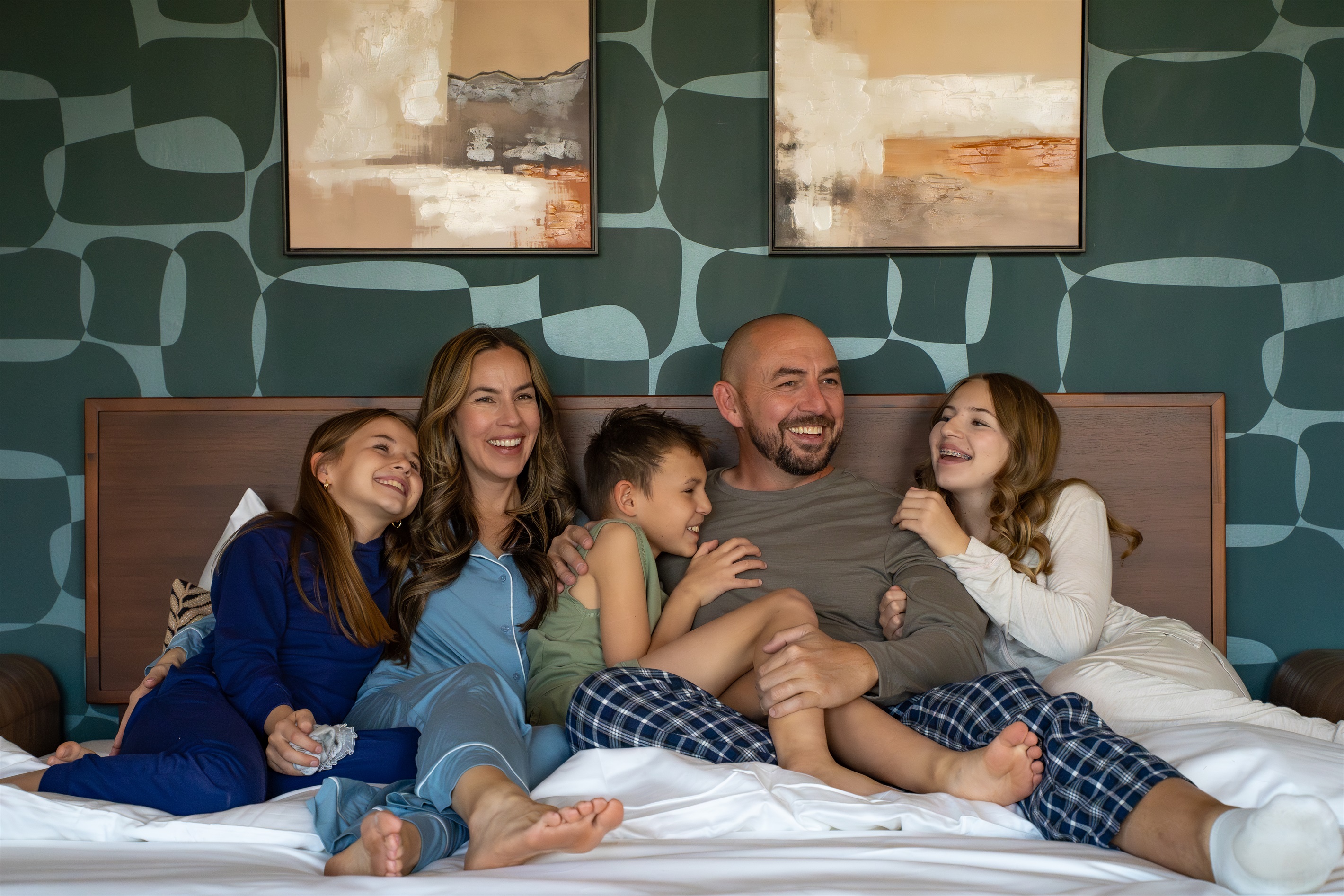 Wake up to absolute luxury. Enjoy mornings with family in bed with our plush, professionally laundered linens and premium mattresses for the perfect night's sleep.