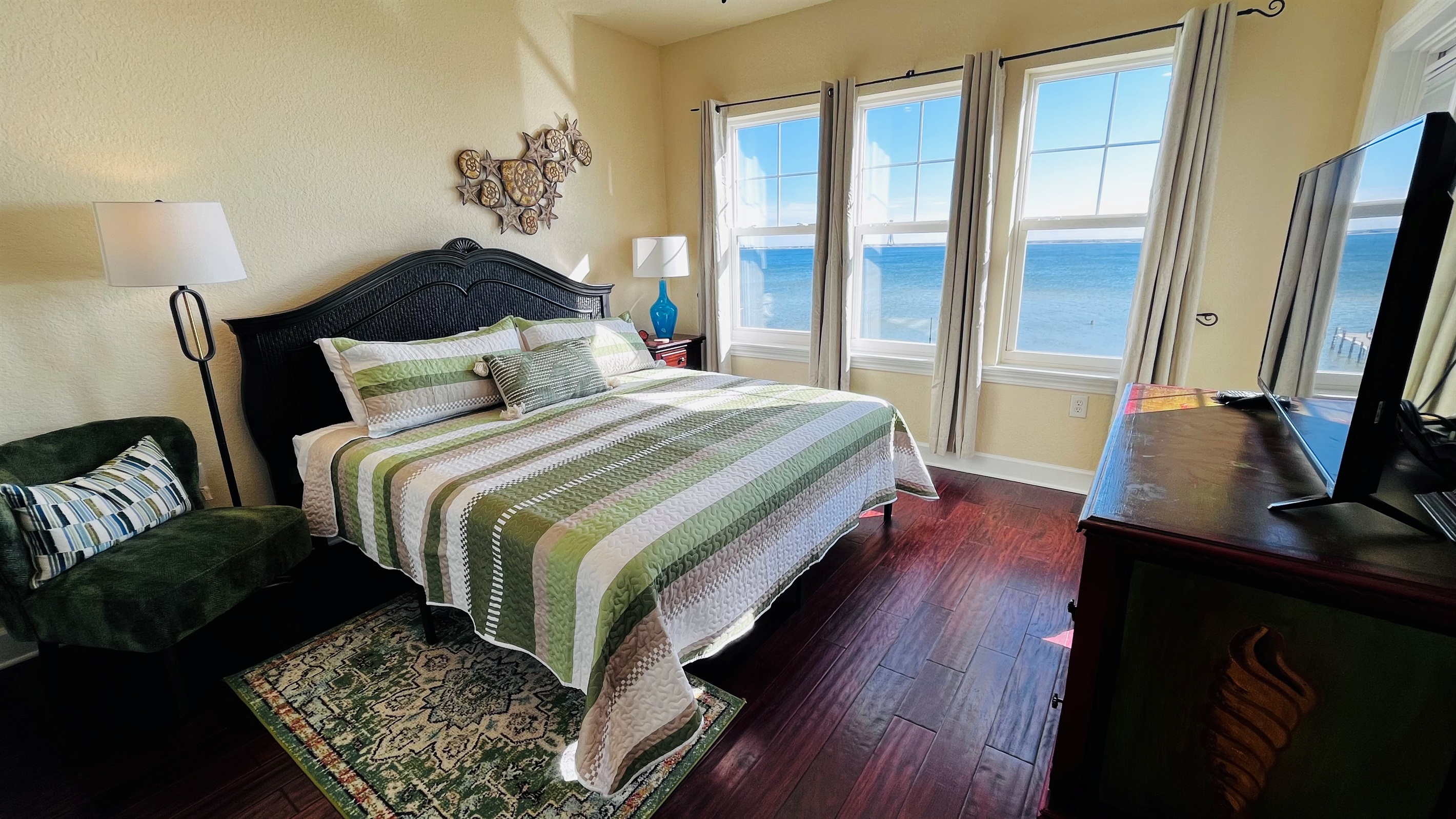 The comfortable king room has gorgeous views of The Sound with balcony access.