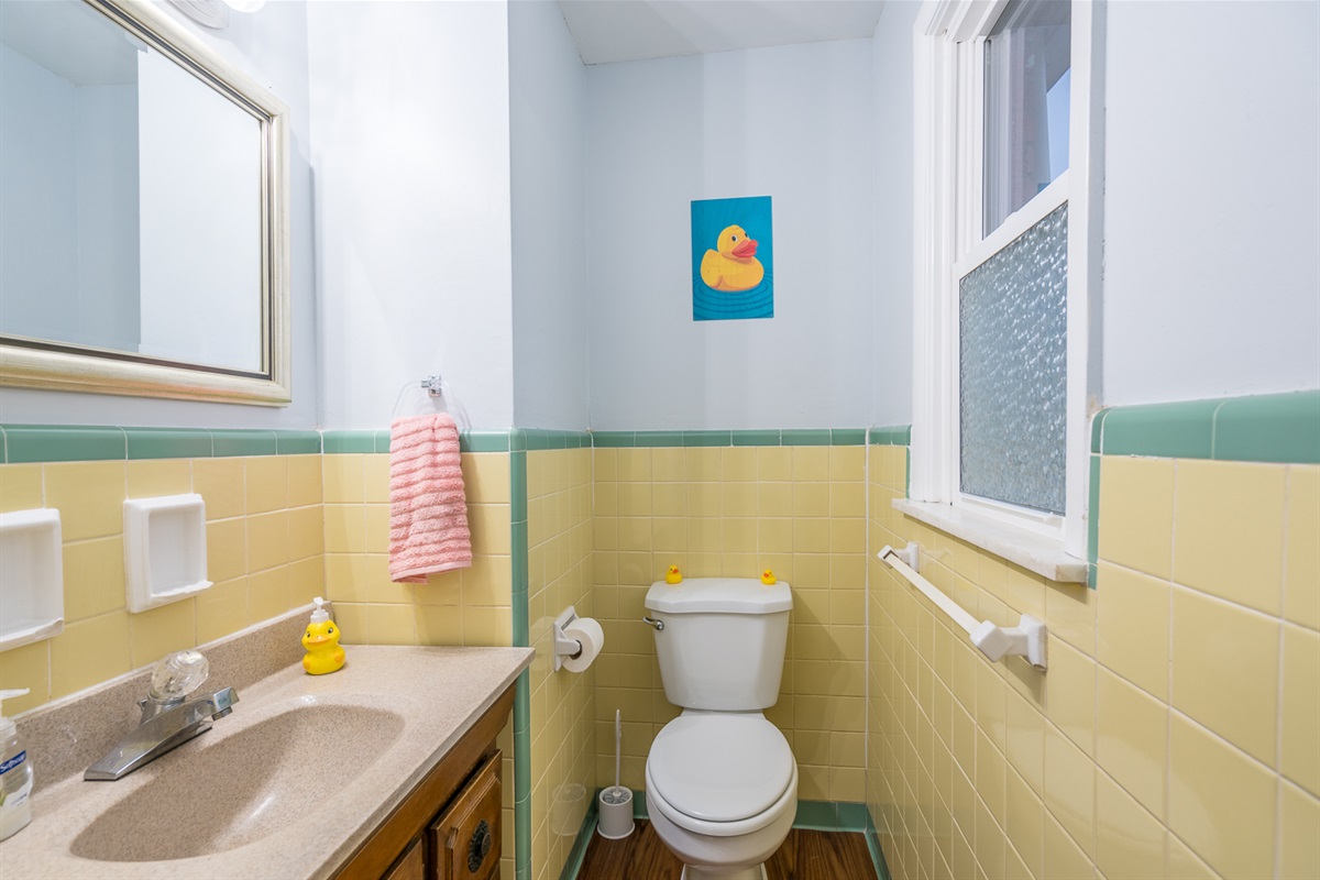 Main Floor Half Bath in the original retro yellow :)