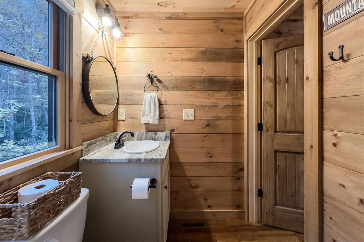 Our bathroom sink and mirror offer a pristine sanctuary where cleanliness meets serenity. Bask in the peaceful ambiance as you prepare for the day ahead or unwind in the evening glow