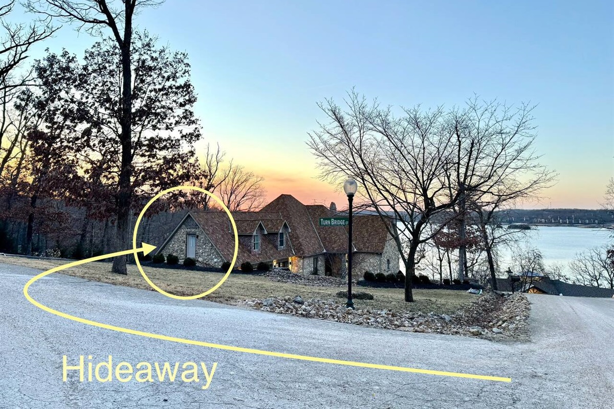The house is located on a corner lot. The Hideaway is accessible from the side street before getting to the house. 