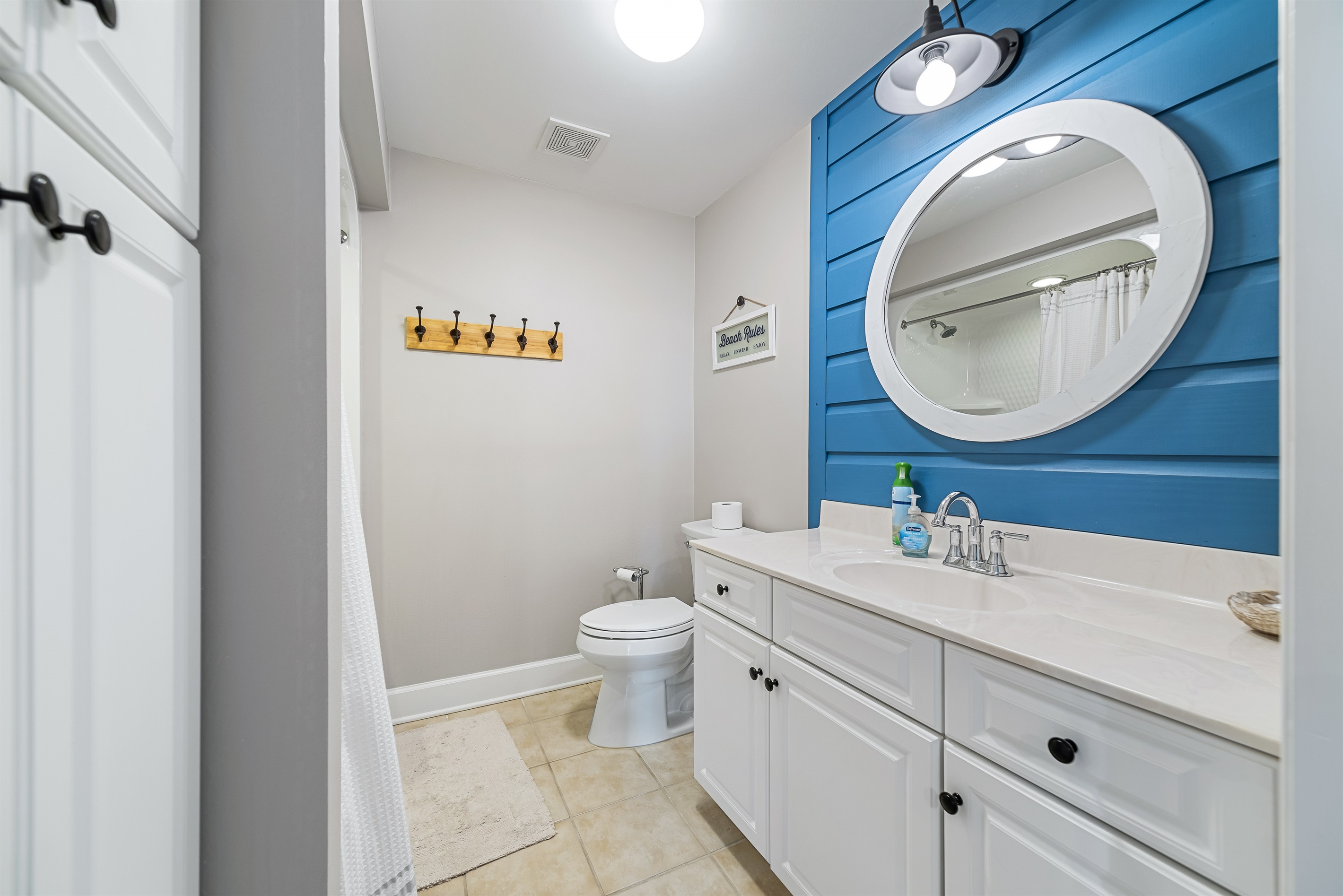A bright and functional bathroom designed for comfort. Enjoy a clean and refreshing space during your stay.