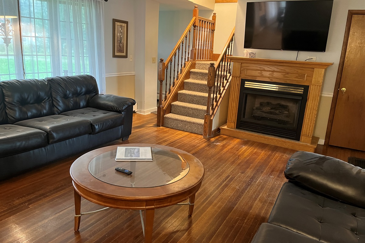 Main house Living room with staris to 2nd floor