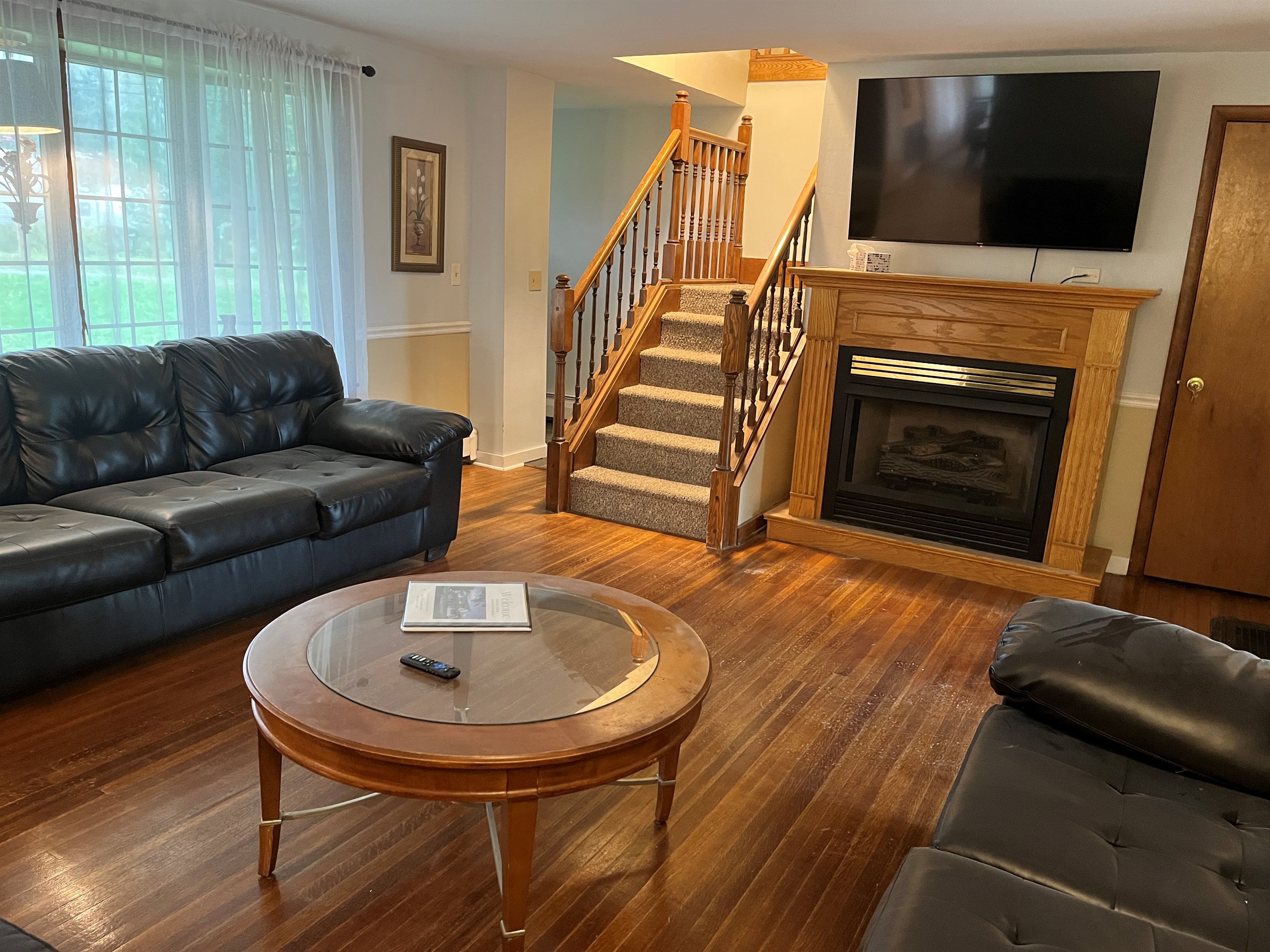 Main house Living room with staris to 2nd floor