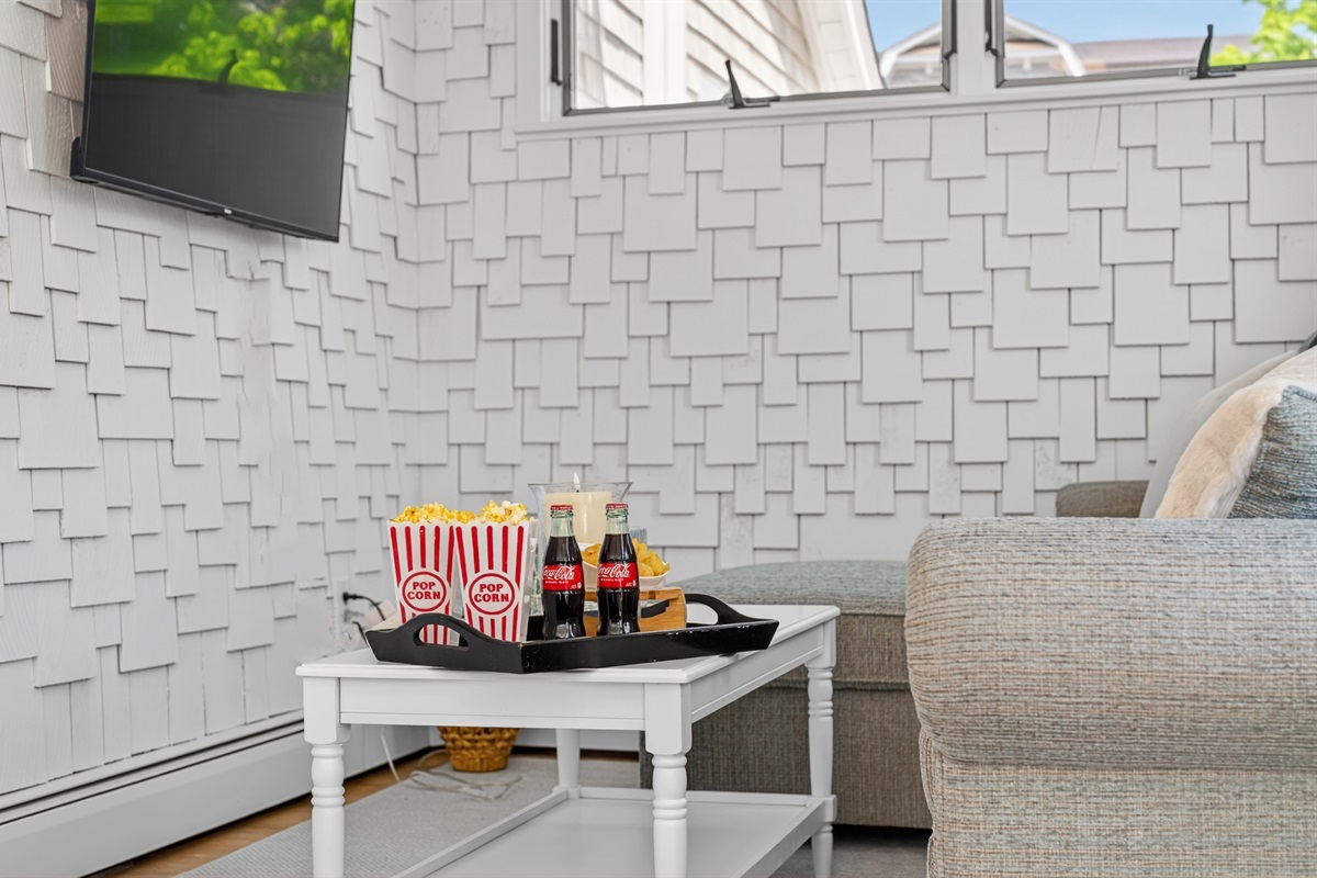 A relaxed setup ideal for sharing snacks, refreshments, and wine while enjoying a comfortable and social atmosphere.