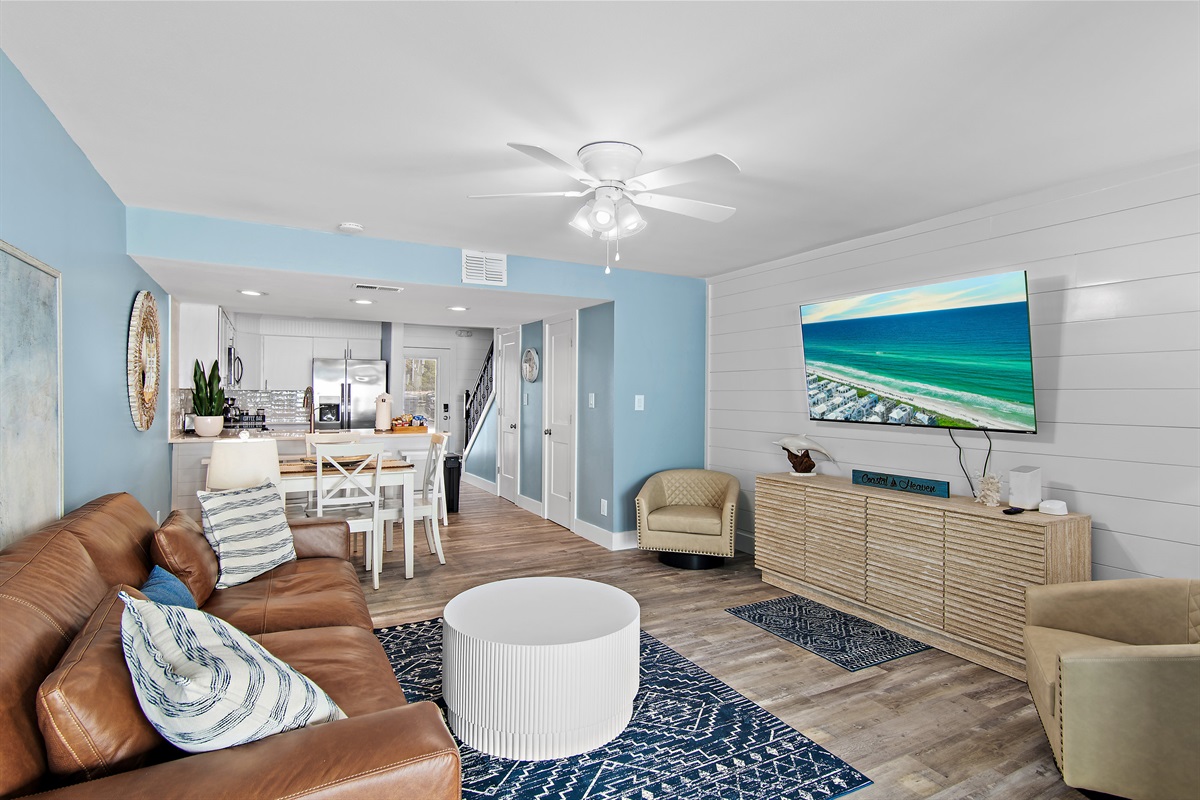 2nd Floor has the Primary Living Space featuring Gulf Views, All New Leather Furniture, a 75" Smart TV, Remodeled Kitchen, Dining Space, Half Bath, and access to the Gulf View Patio!