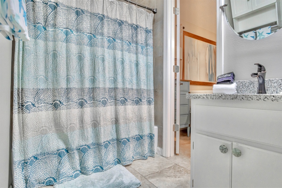 Guest bathroom with tub/shower combo