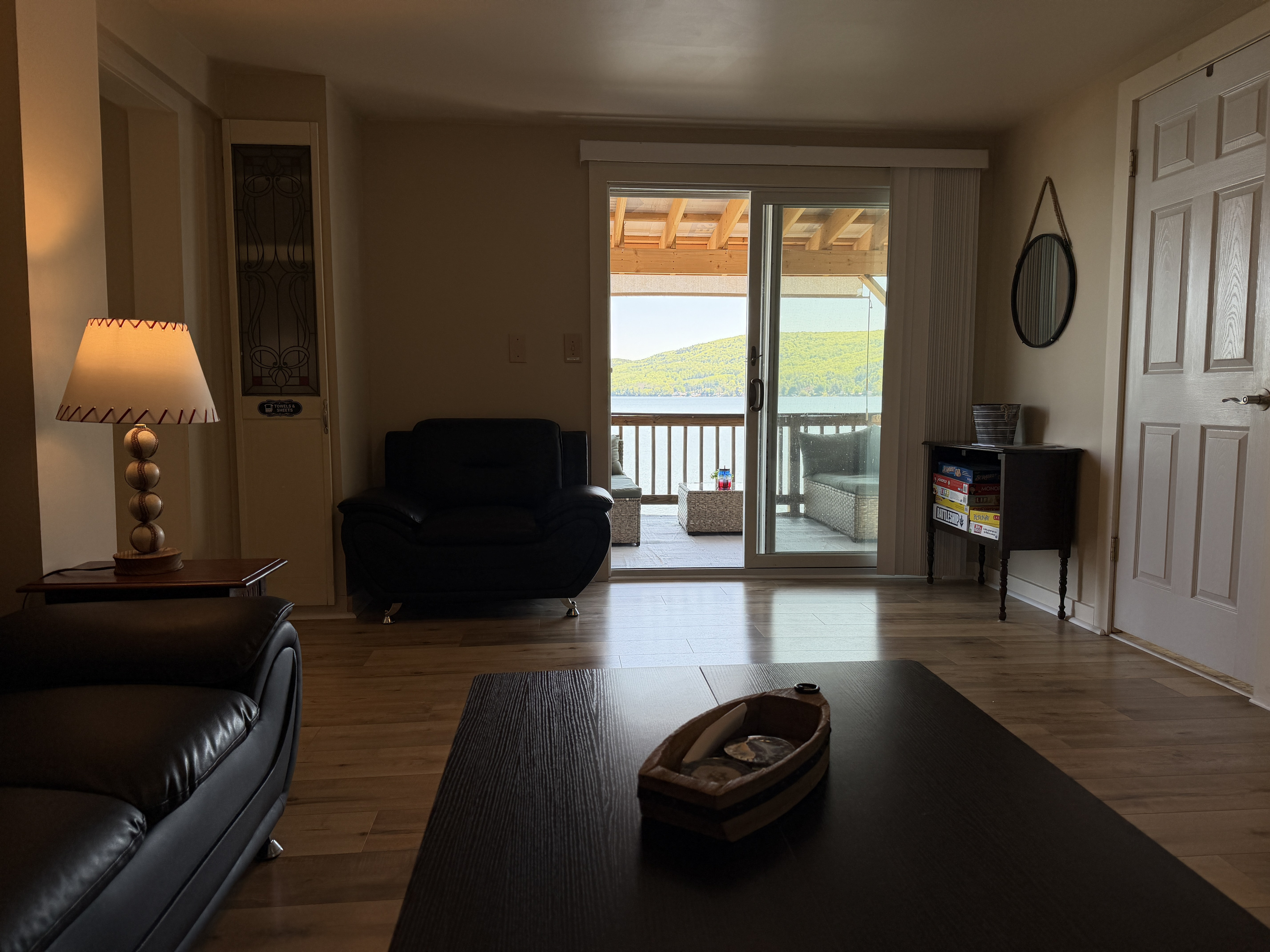 Den with a view of Canadarago Lake beyond