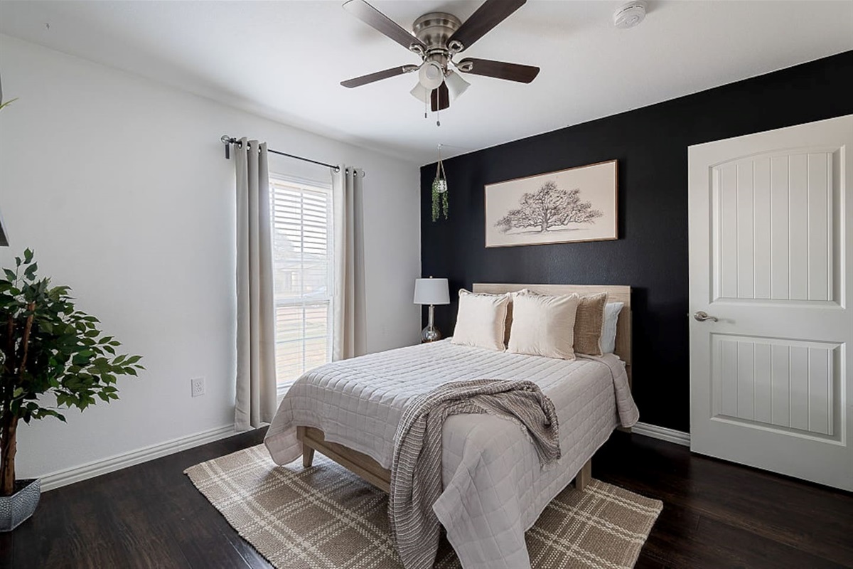 Enjoy this comfortable double bed, nightstand, lamp and closet with extra storage for your ultimate relaxation during your stay