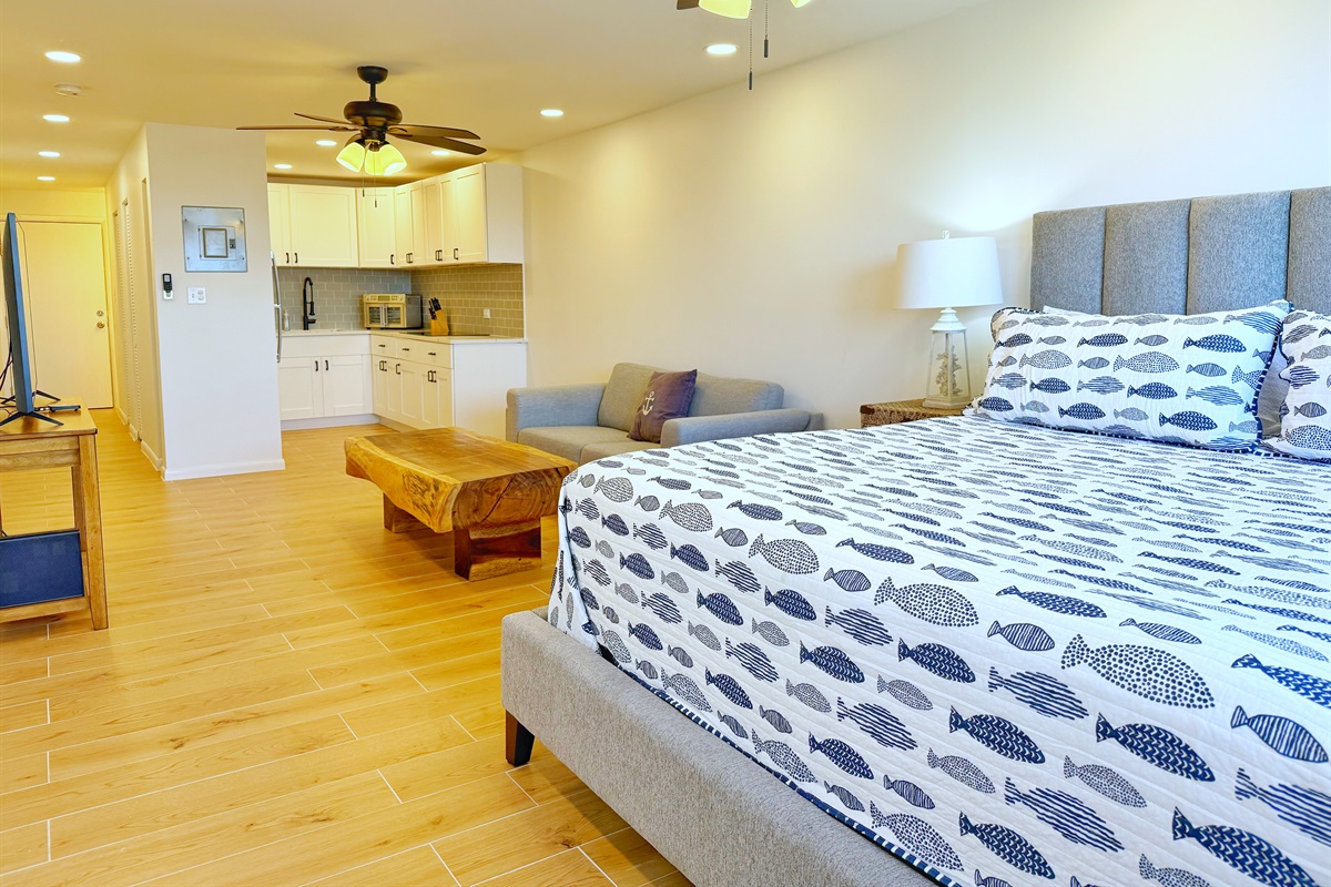 Spacious, simple area with a living room that has a smart flat screen television and cable. Ceiling fans in both spaces to keep you cool. 