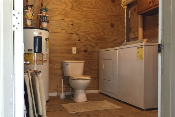 Laundry room and 1/2 bath for a quick run from the beach.
