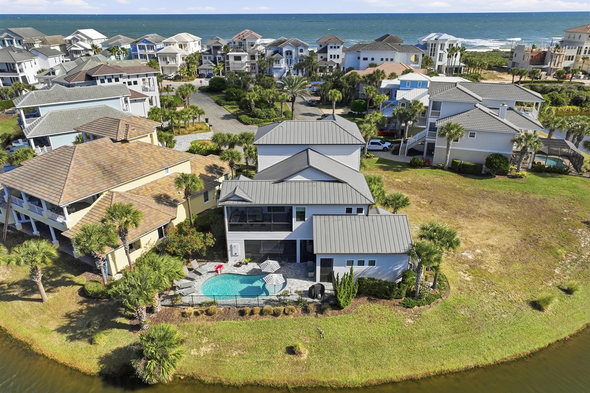 Best of both worlds 🌊✨
Your private pool retreat sits on a peaceful lake lot with sweeping community views—just a short stroll to the beach and ocean breeze.