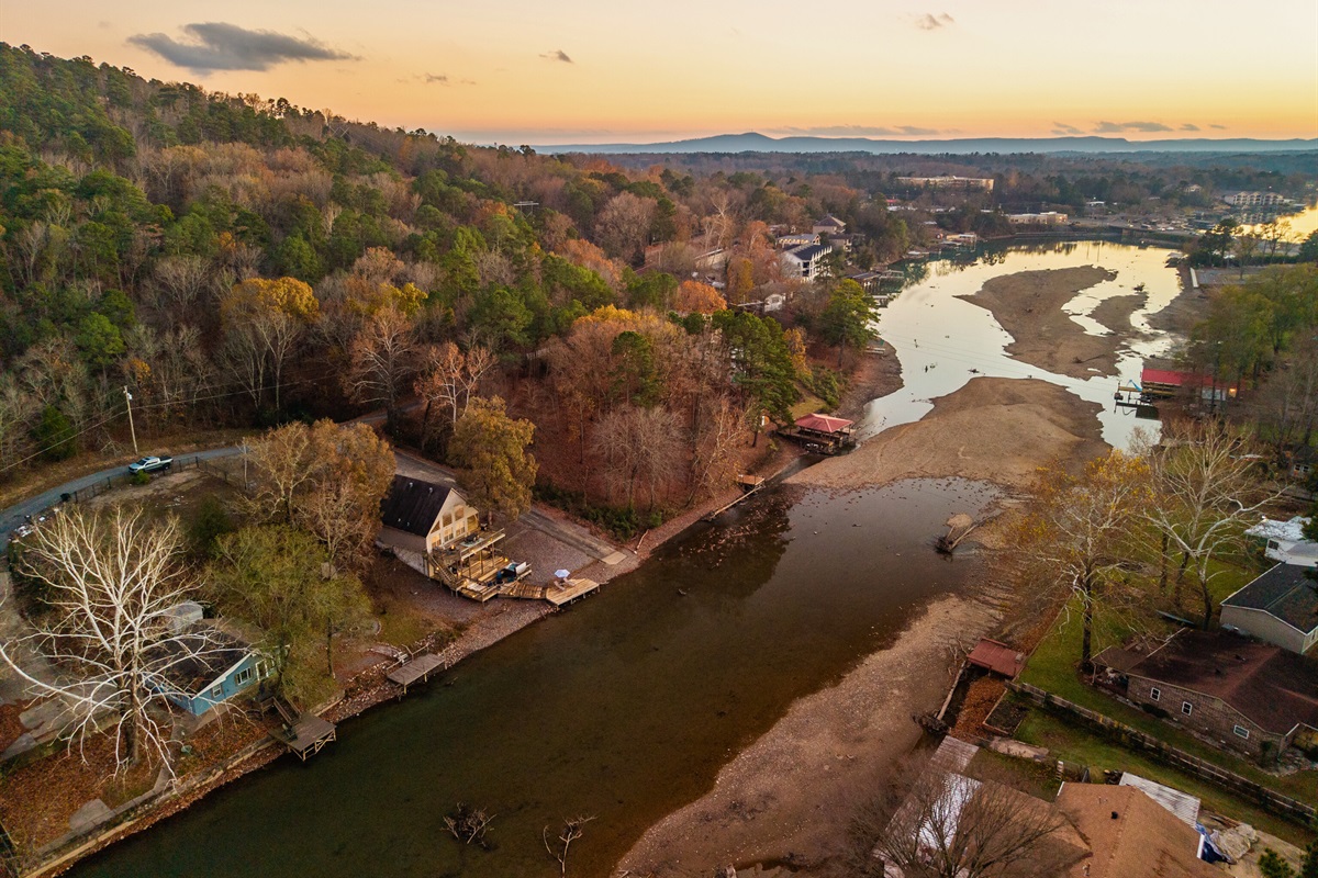 The aerial shot reveals just how serene and scenic the surrounding landscape is, with nature stretching out in all directions.
