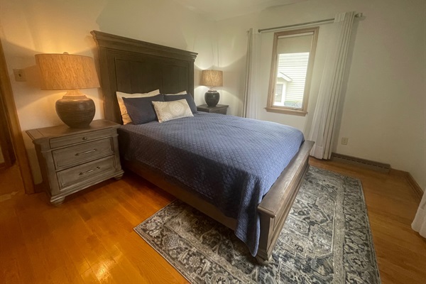 Master bedroom with 42" TV and dresser.