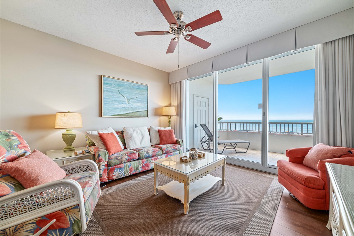 The seamless transition to the outdoor balcony enhances the sense of light and openness.