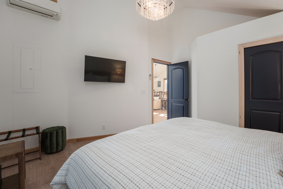 1 King bed with a twin sleeper sofa that was added after this photo was taken. This room sleeps 3