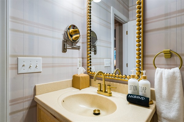 Stocked with essentials and designed with style, this bathroom makes getting ready a pleasure.