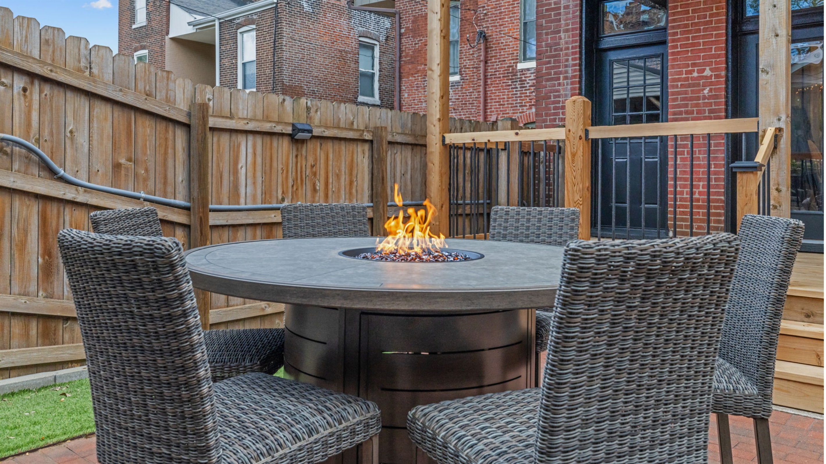 Share a meal around the outdoor dining table or gather round to keep warm with the center fire table feature.