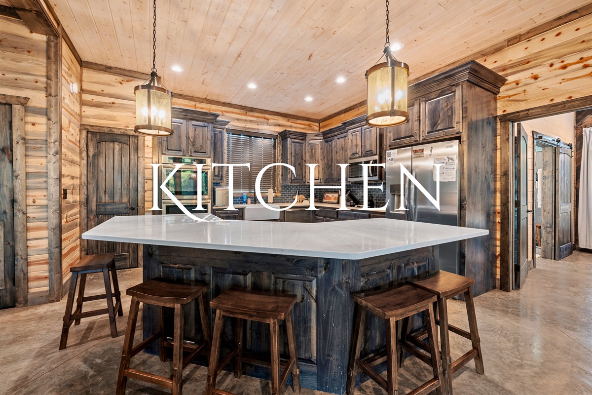 This stylish kitchen features everything you need to whip up a delicious meal, with modern appliances and plenty of prep space.