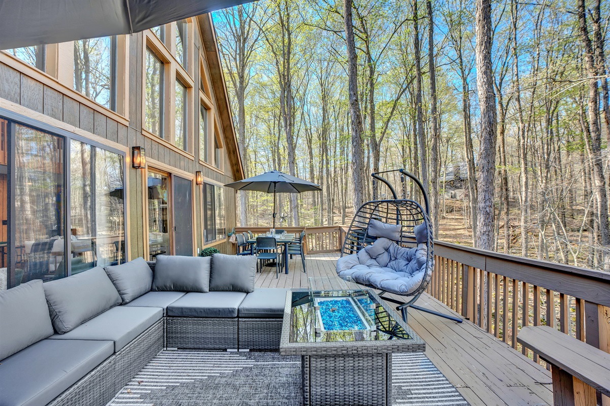 “Ultimate chill zone — egg chair views and forest serenity.”