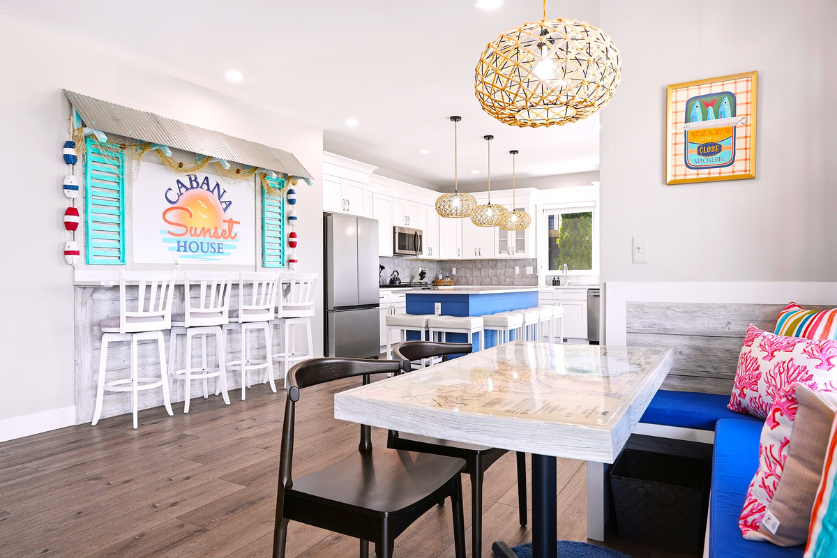 Enjoy meals together in this bright, open dining area with comfortable booth seating, just steps from the spacious kitchen and designed for easy entertaining.