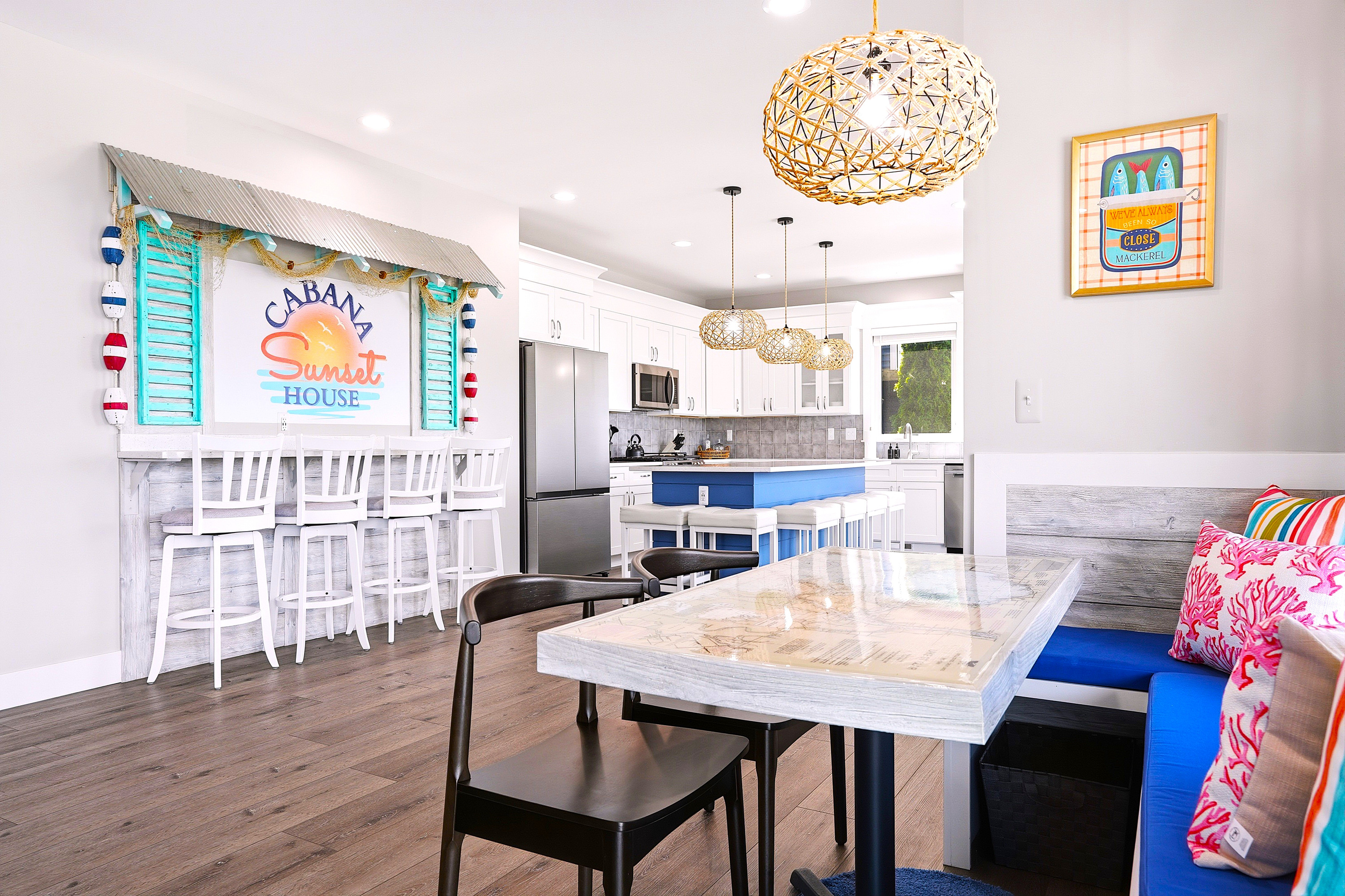 Enjoy meals together in this bright, open dining area with comfortable booth seating, just steps from the spacious kitchen and designed for easy entertaining.
