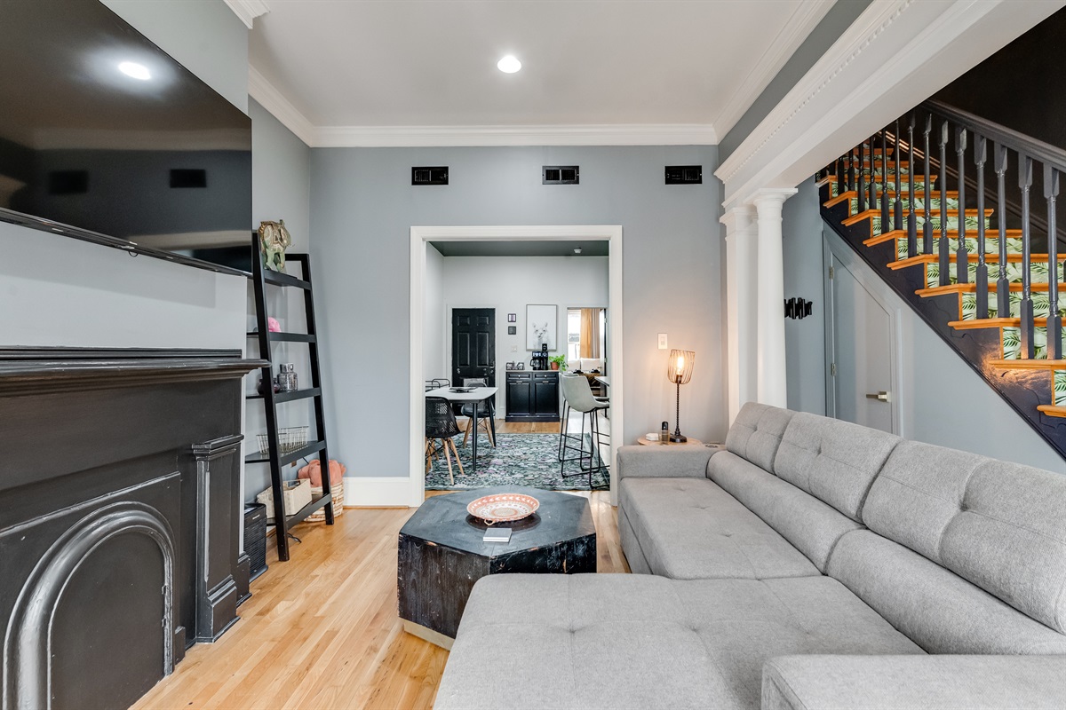Living Room: Modern vibes with an inviting sectional and striking decor—your Richmond retreat awaits!