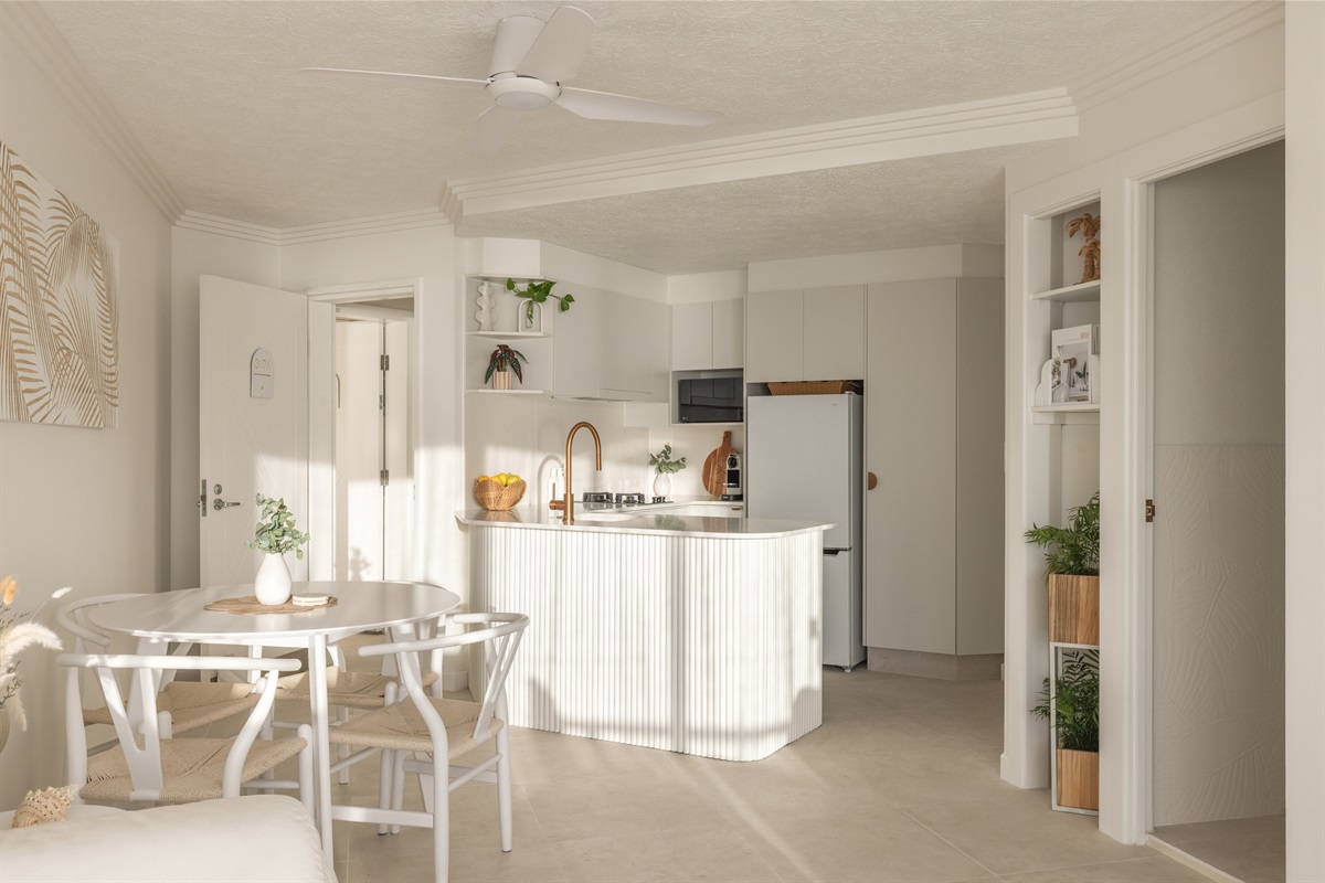 Beautifully renovated kitchen & dining area with premium appliances & coastal styling.